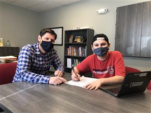 Dr. Ben Hebisen with Student 
